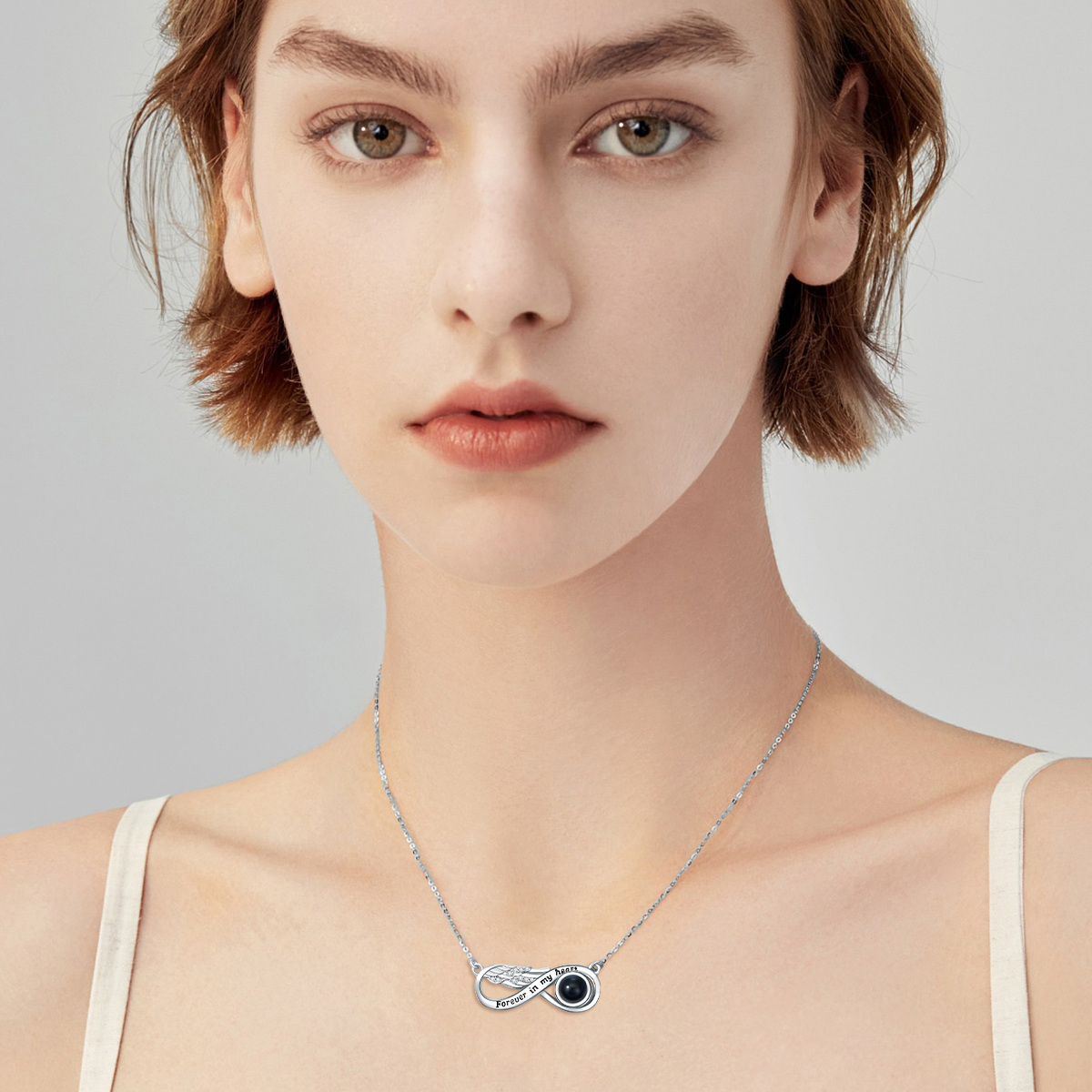 Sterling Silver Angel Wing Necklace, 'I Love You' in 100 Languages